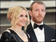 Madonna gives Guy £50m in divorce